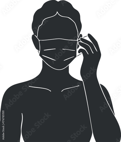 Person adjusting a protective mask demonstrating health safety measures during a pandemic situation