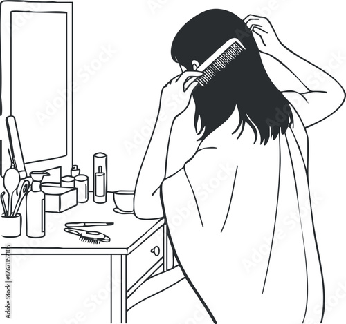 A woman combing her hair in front of a mirror in a bathroom setting.