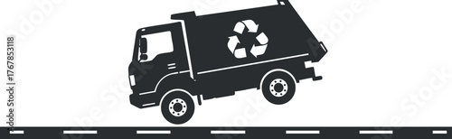 A silhouette of a recycling truck on a road emphasizing environmental sustainability and waste management.