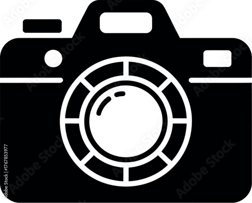A simple, graphic icon of a camera is presented in black and white.