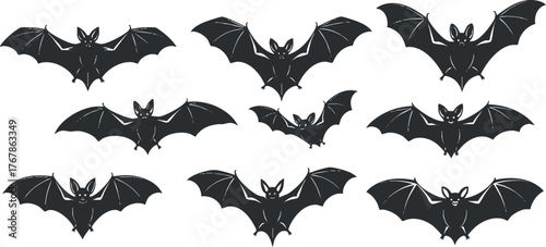 A collection of bat silhouettes showcasing various flying poses and styles suitable for Halloween themes.