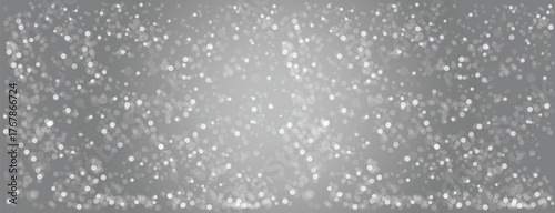 A festive Christmas bokeh overlay with sparkling magical dust particles. A vector illustration of glowing white and gray circles on a black background. A special light effect for holiday winter design