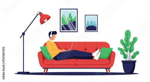 A man wearing headphones relaxes on a red couch using a laptop, with a floor lamp and potted plant nearby.