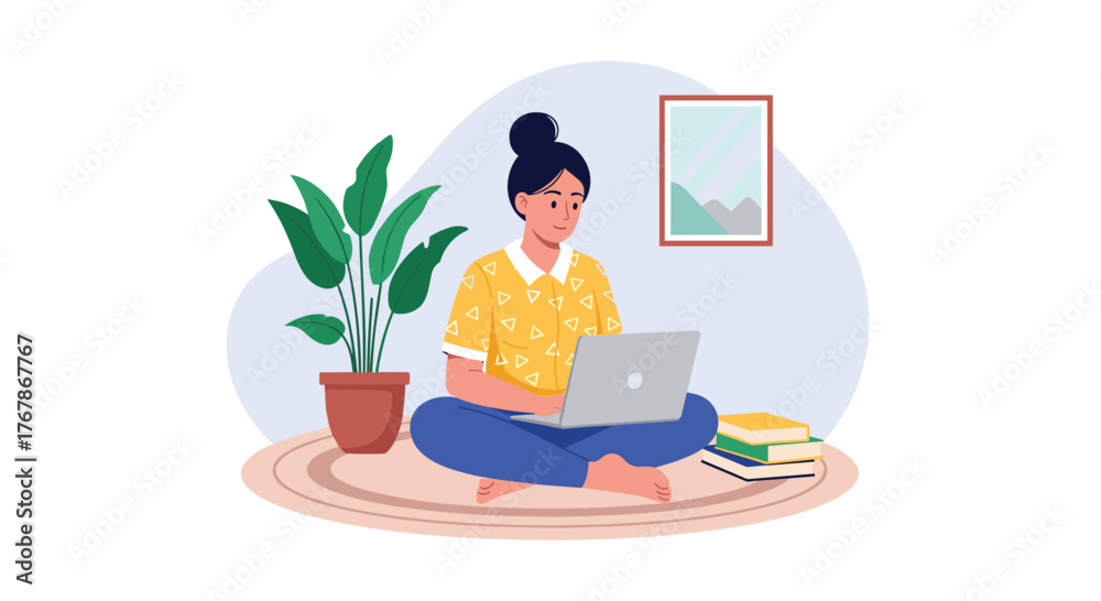 Fototapeta premium Woman sitting cross-legged on a rug with a laptop and books, next to a potted plant.