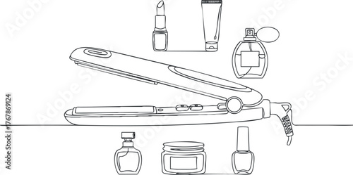 A collection of beauty tools including a hair straightener, cosmetics, and skincare products.