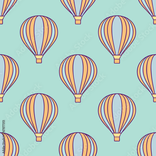 Seamless pattern of colorful hot air balloons on a light green background design