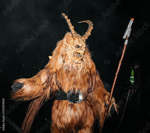 Canvas Print Krampuslauf Noetsch festival features a costumed figure of Krampus, showcasing i