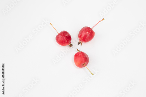 Apples. Fruits of a small-fruited apple tree on a white background.