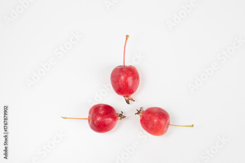 Apples. Fruits of a small-fruited apple tree on a white background.