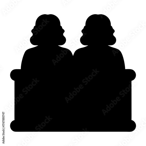 Black silhouette of two women sitting on a vintage couch together