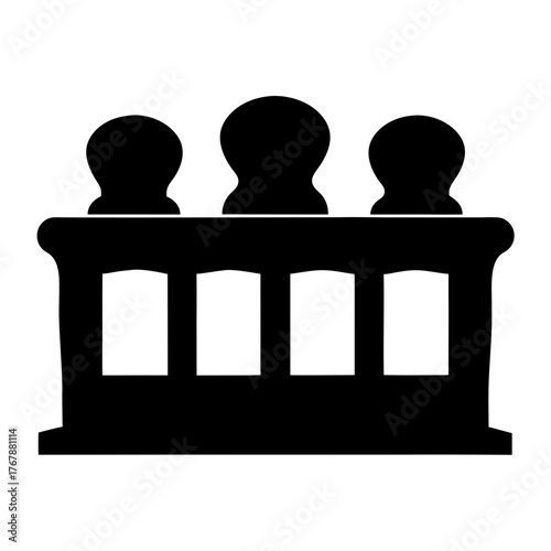 Silhouette of three figures seated behind a traditional barrier or desk