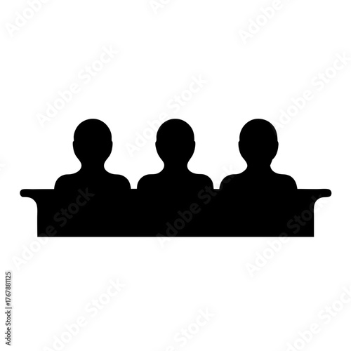Silhouette of three people sitting together in a dark, shared space.