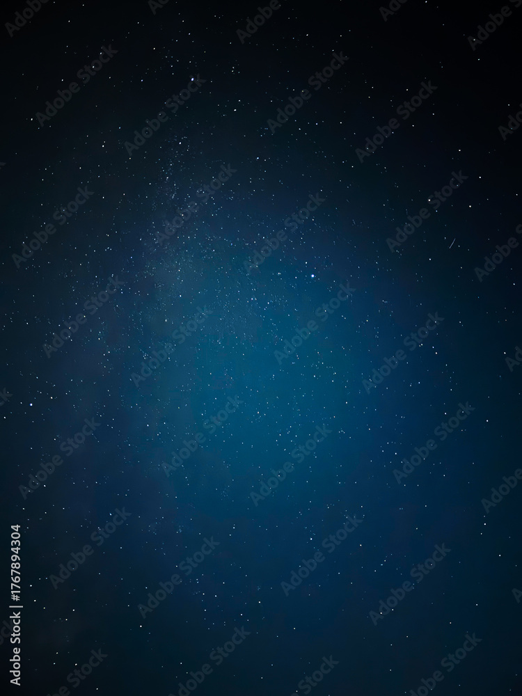 Fototapeta premium Stunning Starry Night Sky over Dark Landscape