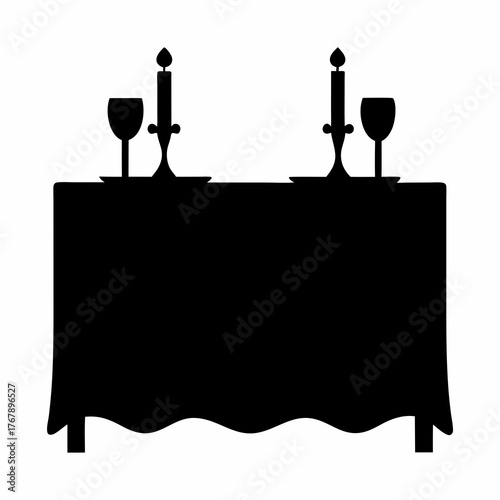 Elegant silhouette of a romantic dinner table with candles and wine