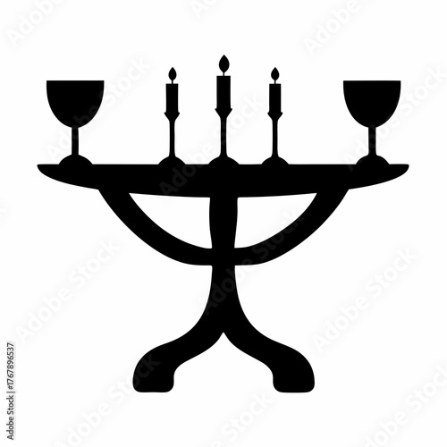 Elegant candelabra with wine glasses, a timeless silhouette of celebration and tradition