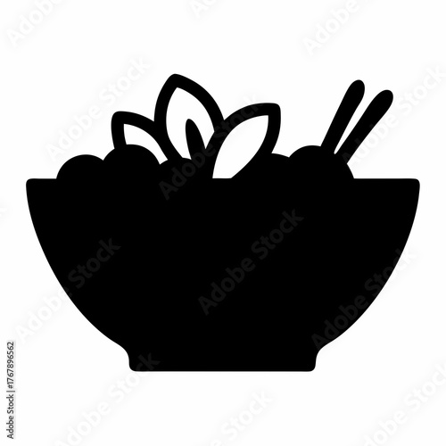 Silhouette of a bowl containing salad with chopsticks and fresh leaves