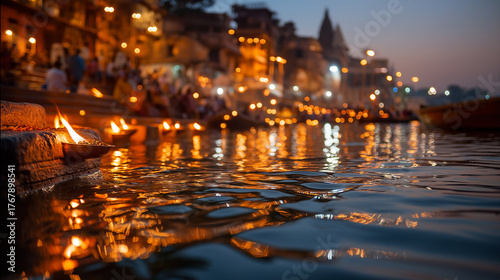 Ganga Aarti at Varanasi ghats, lamps reflected on water, golden dusk, India, Varanasi, Ganges, aarti, spirituality, ritual, river, pilgrimage, culture, with copy space