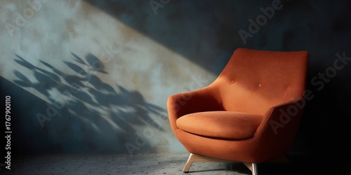 Chair is sitting in front of a wall with a shadow on it