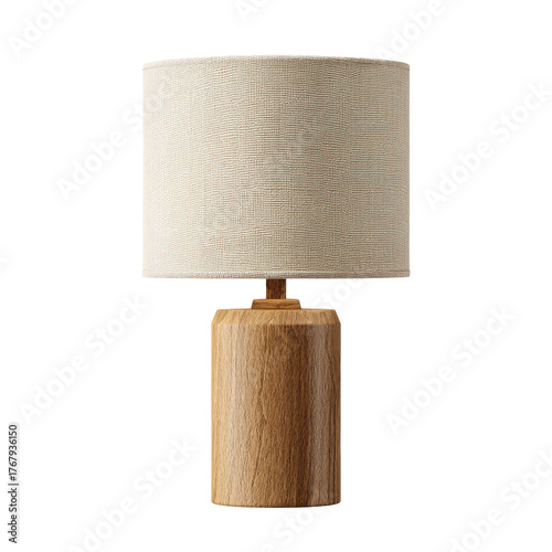 A tan fabric lampshade on light-wood base, against a black background, casting a warm glow