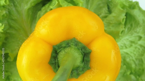 lettuce and sweet bell pepper on a rotating backgr