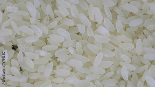 grains of rice on a rotating background.