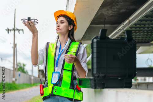 Female Engineer Using Drone for Infrastructure Survey