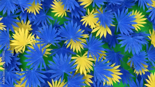 Vibrant arrangement of blue and yellow leaves on a green background