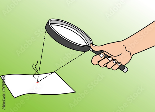 Paper burning experiment with focused light with magnifying