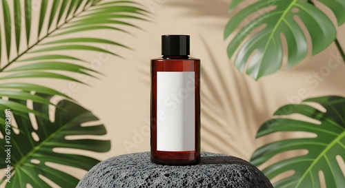 amber skincare bottle with black cap placed on stone surrounded by tropical palm leaves in soft natural light
