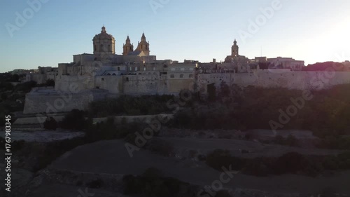 Aerial drone footage of the medieval city of Mdina in Malta a sunset
