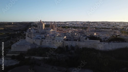 Aerial drone footage of the medieval city of Mdina in Malta a sunset