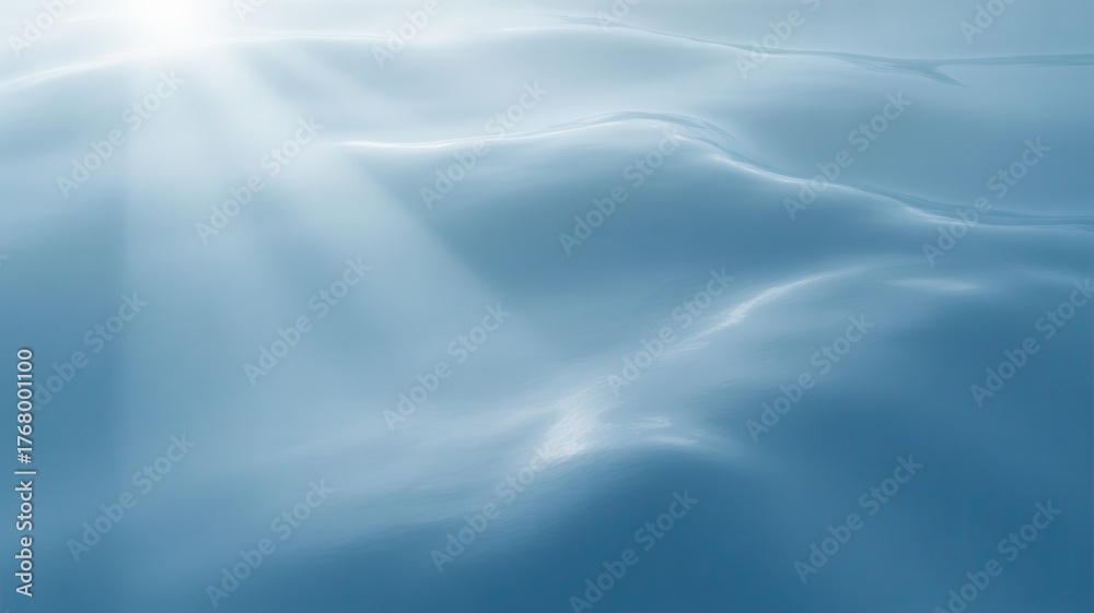 Obraz premium Abstract soft blue and white gradient background with subtle textures and light reflections