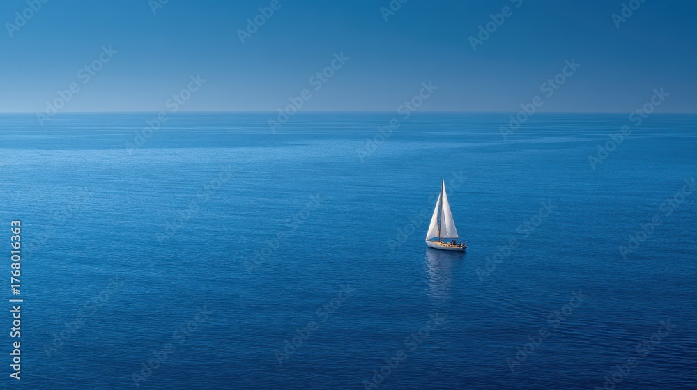 Obraz premium Tranquil Sailing Scene with White Yacht on Serene Blue Waters