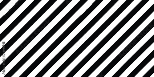 Bold black and white diagonal stripes create a striking visual pattern.