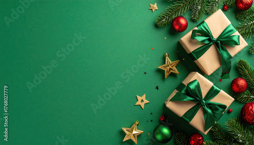Christmas Eve concept. Top view photo of gift boxes with ribbon bows green red baubles gold star ornaments and pine branches on isolated green background with copyspace in the middle
