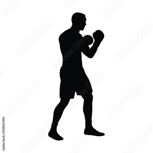 Silhouette of a boxer in a defensive stance, ready to fight with gloves and shorts