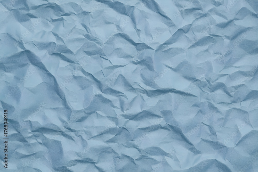 Obraz premium Close up of textured light blue crumpled paper background
