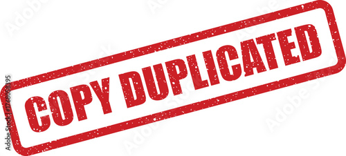 Grungy red rectangular rubber stamp impression with the bold text COPY DUPLICATED diagonally oriented