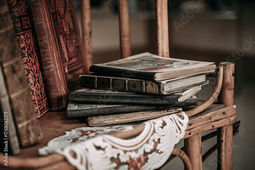 Old paper books are on a vintage bookcase