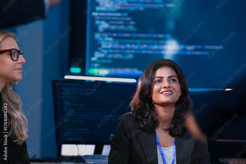 © ultramansk - Two female tech leaders, one Indian and one Caucasian, focus on a presentation about future strategy. They are planning sustainable AI innovation and ESG goals for growth. © ultramansk - Two female tech leaders, one Indian and one Caucasian, focus on a presentation about future strategy. They are planning sustainable AI innovation and ESG goals for growth.