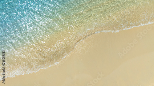 Nature of the ocean and blue sky Summer with sunshine, sandy beaches, clear blue waters sparkling against the blue sky. on an island with good ecology and environment Background for summer vacation