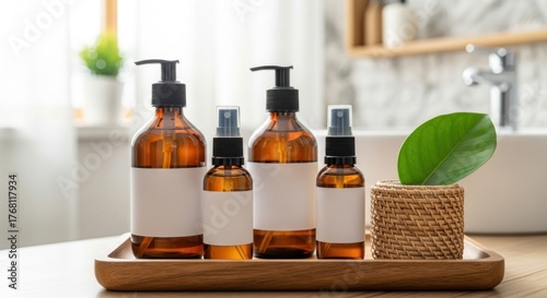 Amber bottles with pumps and sprays, some with blank labels, arranged on tray