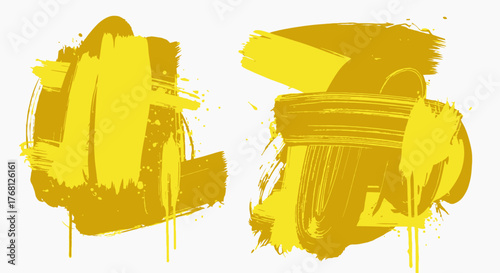 Vibrant yellow brush strokes creating abstract art with dynamic splatter effects on canvas