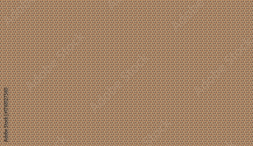 Close up view of a textured woven fabric in earthy brown and beige tones