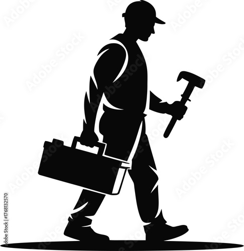 Silhouette of a builder walking with a hammer and tool box