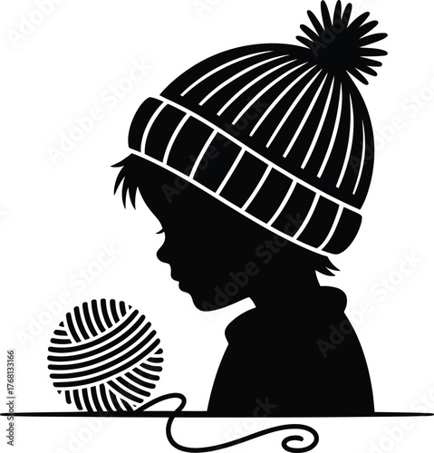 Child s winter hat with pom pom and yarn ball silhouette
