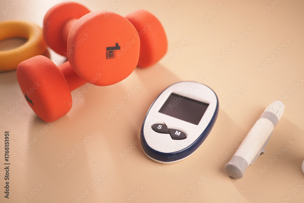 Fototapeta premium Workout gear and health devices on a gym surface