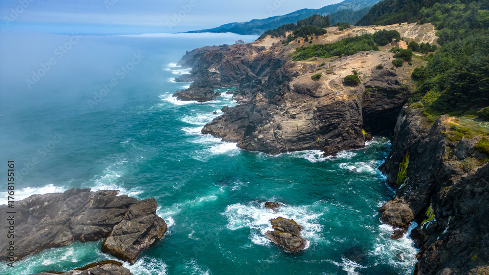 Fototapeta premium Aerial photo of Oregon rocky coast along Samuel H Boardman sceni corridor