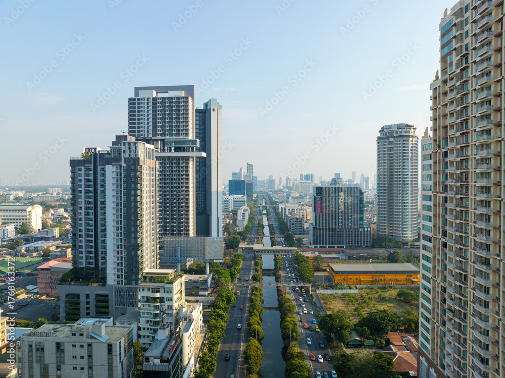 Obraz premium Aerial view modern office building with transport road sunset sky Silom financial district