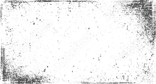 Grungy distressed texture with dark speckles and scratches grunge background